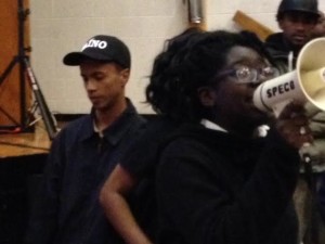 Newark Student Union leaders Jose Leonardo (left) and Tanaisa Brown, lead chants in White's support